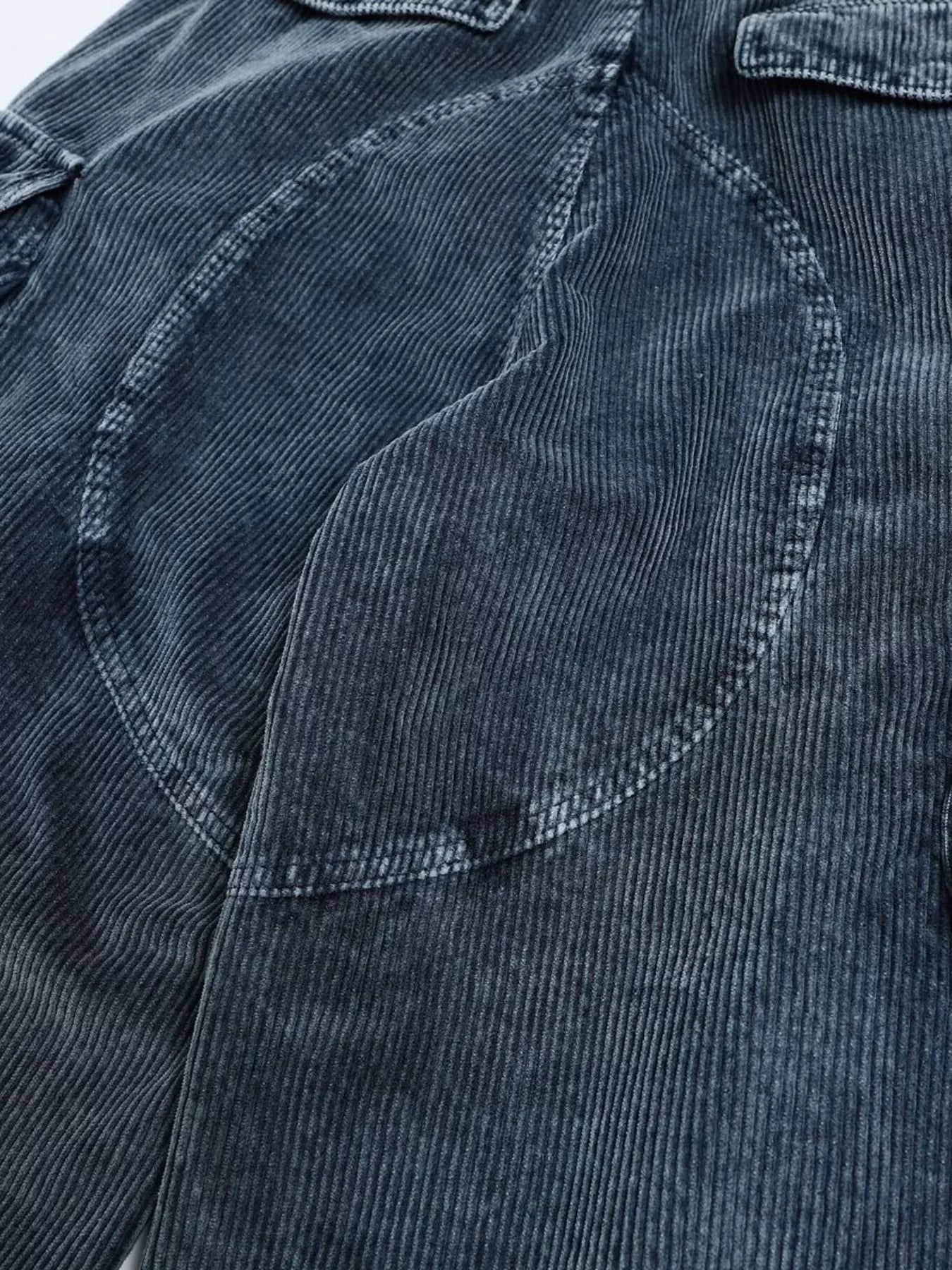 Men's blue corduroy cargo pants with multiple pockets from Trendsi, featuring a relaxed fit and functional design.