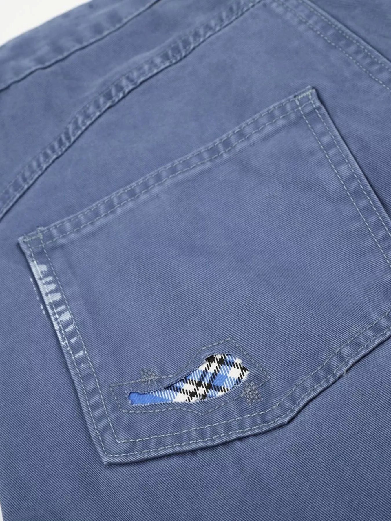 Men's distressed cargo capris in blue by Trendsi, featuring a relaxed fit with cargo pockets and a casual, worn-in look.