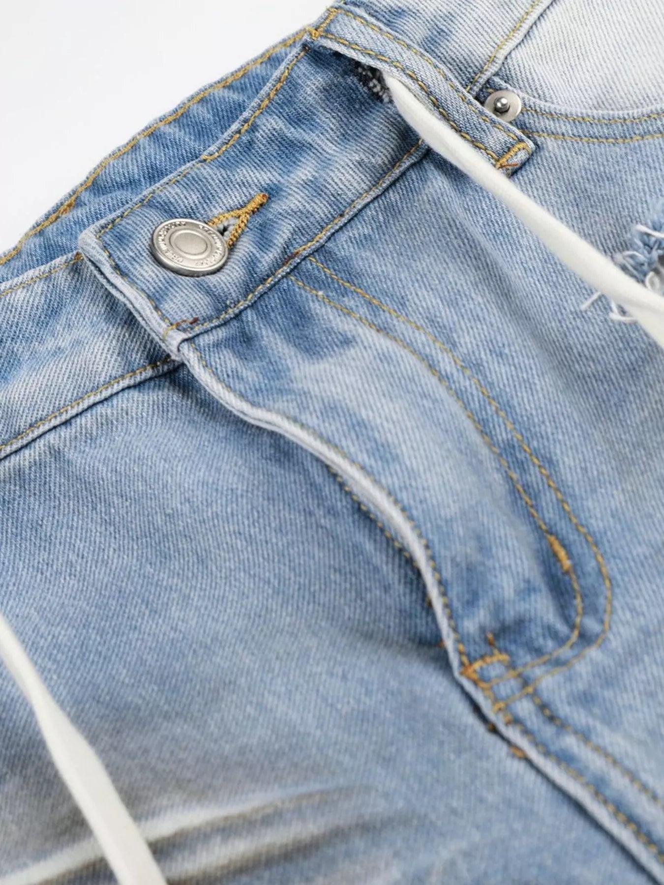 Men's full-size distressed wide-leg Capri jeans by Trendsi, featuring a casual fit and distressed denim details.