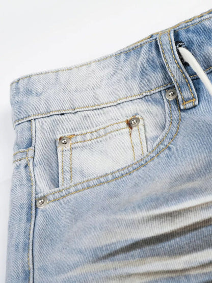 Men's full-size distressed wide-leg Capri jeans from Trendsi, blue denim with ripped details, casual and relaxed fit.