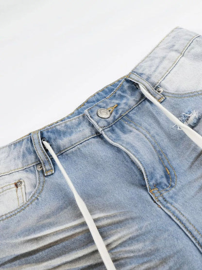 Men's full-size distressed wide-leg Capri jeans by Trendsi, blue denim with casual, wide-leg fit and distressed details.