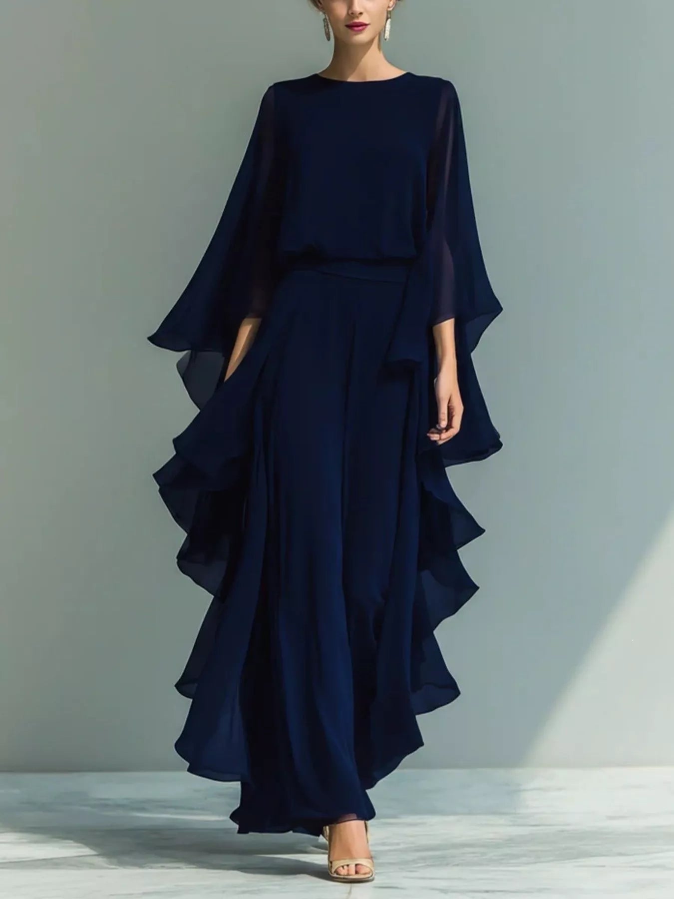 Blue ruffled chiffon long sleeve top and matching pants set by Trendsi, elegant and flowy fashion ensemble for women.