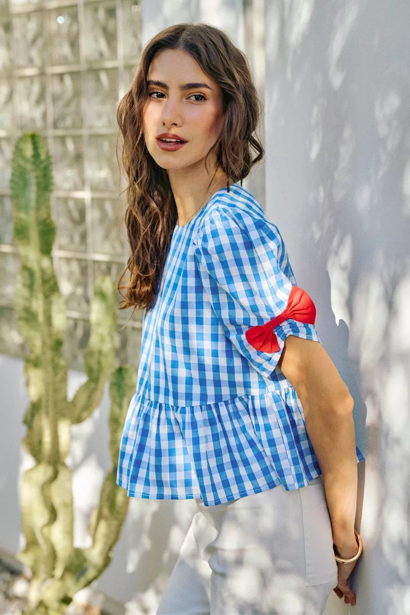 Blue SO ME 4th of July gingham blouse with ribbon details, short sleeves, trendy casual top for summer celebrations.