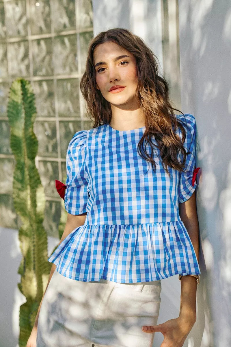 Blue SO ME 4th of July gingham blouse with ribbon details and short sleeves, perfect for festive summer style.