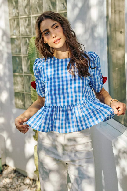 Blue SO ME 4th of July gingham blouse with ribbon detail, short sleeves, trendy spring fashion from Trendsi.