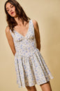 Blue SO ME Froal print fit and flare dress by Trendsi, showcasing a stylish, sleeveless design with a flattering silhouette.