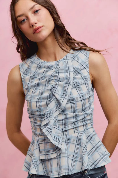 Blue plaid SO ME sleeveless ruffle peplum top by Trendsi, featuring a fitted bodice and feminine ruffle details.