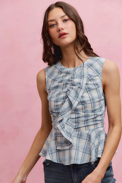 Blue SO ME plaid sleeveless ruffle peplum top by Trendsi, featuring ruffled details and a fitted sleeveless design.