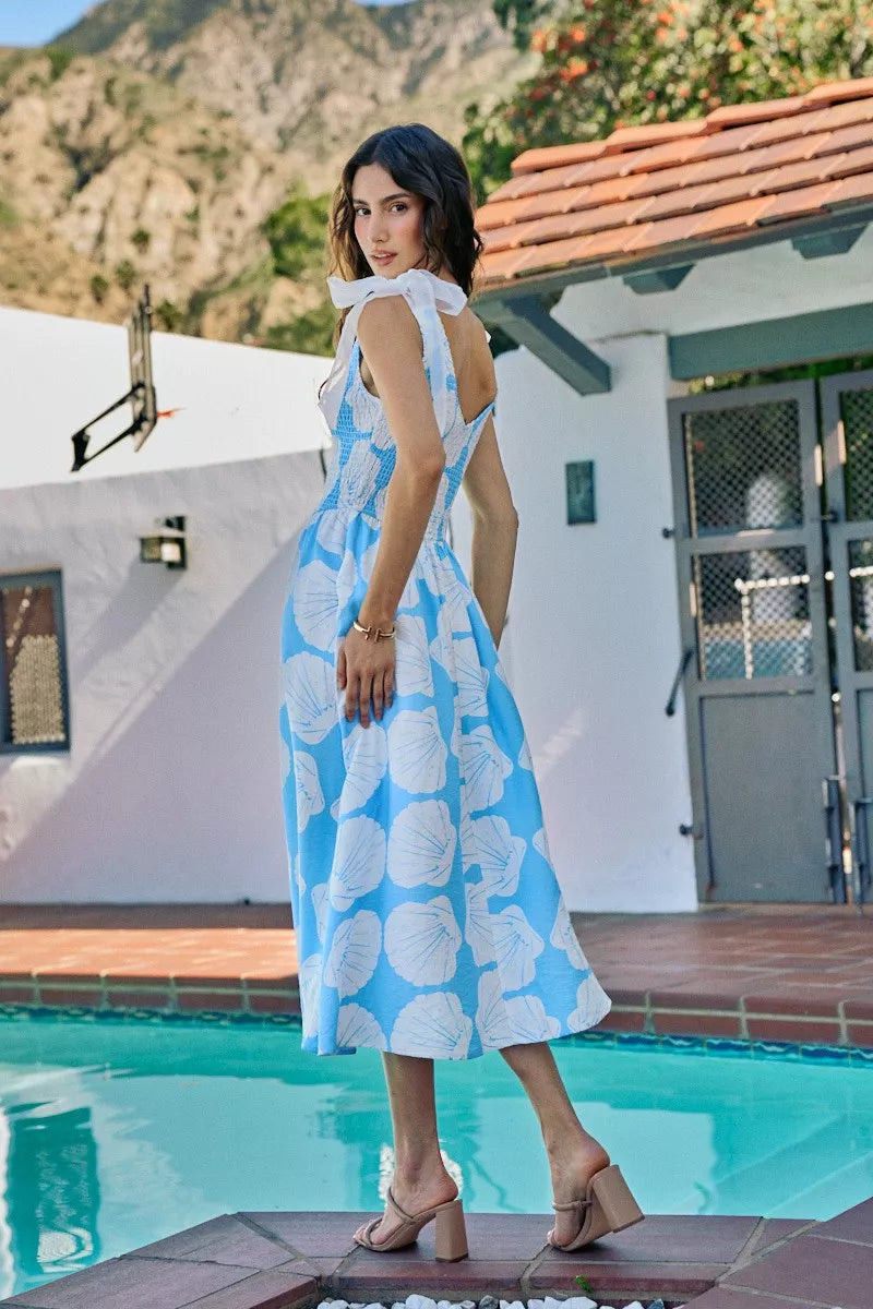 Blue SO ME Shell smocked bodice midi dress with shoulder ties and lining, featuring a stylish and feminine design.