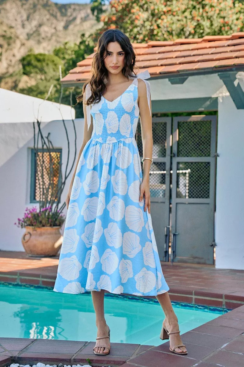 Blue SO ME Shell smocked bodice shoulder tie midi dress by Trendsi with lining, featuring a fitted bodice and stylish shoulder ties.