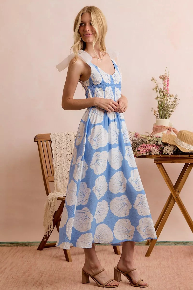 Blue SO ME Shell smocked bodice midi dress with shoulder ties, lined, from Trendsi, shown on a model.
