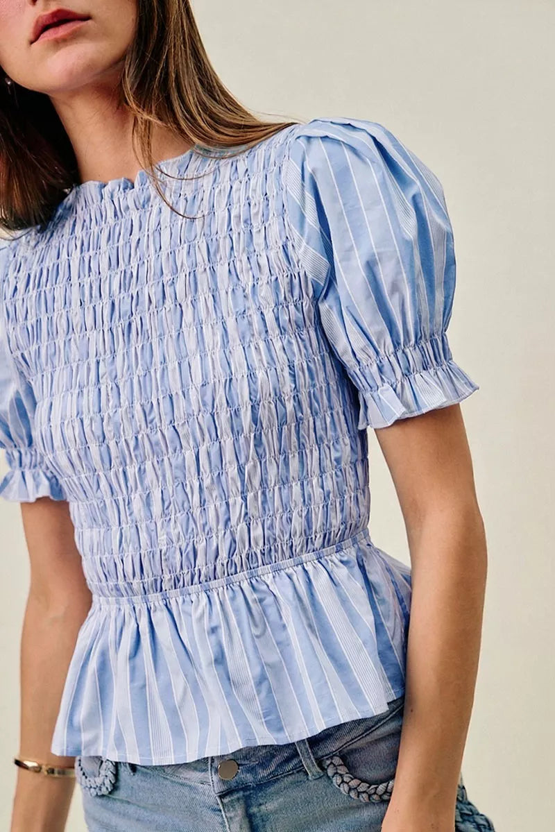 Blue stripe smocked bodice blouse with puff sleeves from SO ME by Trendsi, shown on a model.