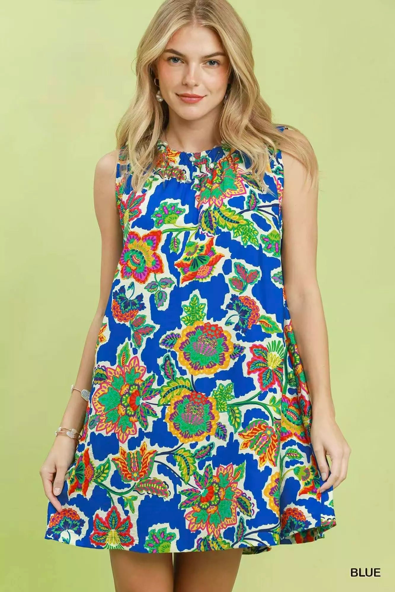 Blue Umgee sleeveless shift dress with an abstract print, featuring a relaxed fit and stylish design.