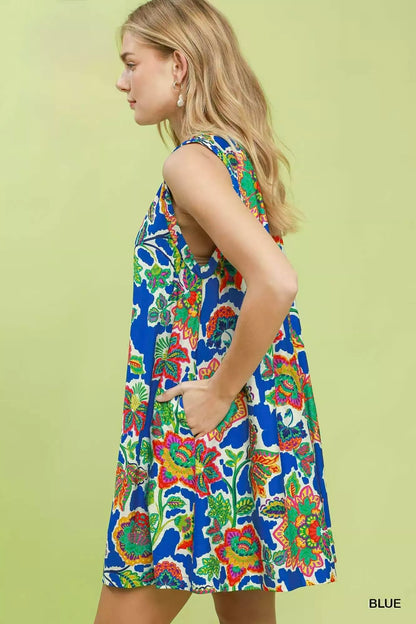 Blue Umgee sleeveless shift dress with abstract print, stylish and casual for warm weather wear.