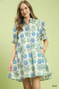Blue Umgee floral puff sleeve babydoll dress with side pockets, featuring a relaxed fit and feminine design.
