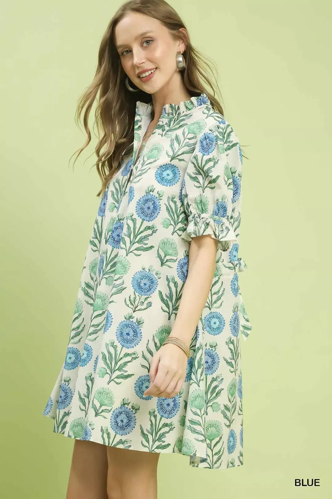 Blue Umgee floral puff sleeve babydoll dress with side pockets, perfect for casual and summer wear.