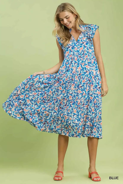 Blue Umgee leaf print midi tiered dress with side pockets, featuring a flowy design and casual, boho-inspired style.