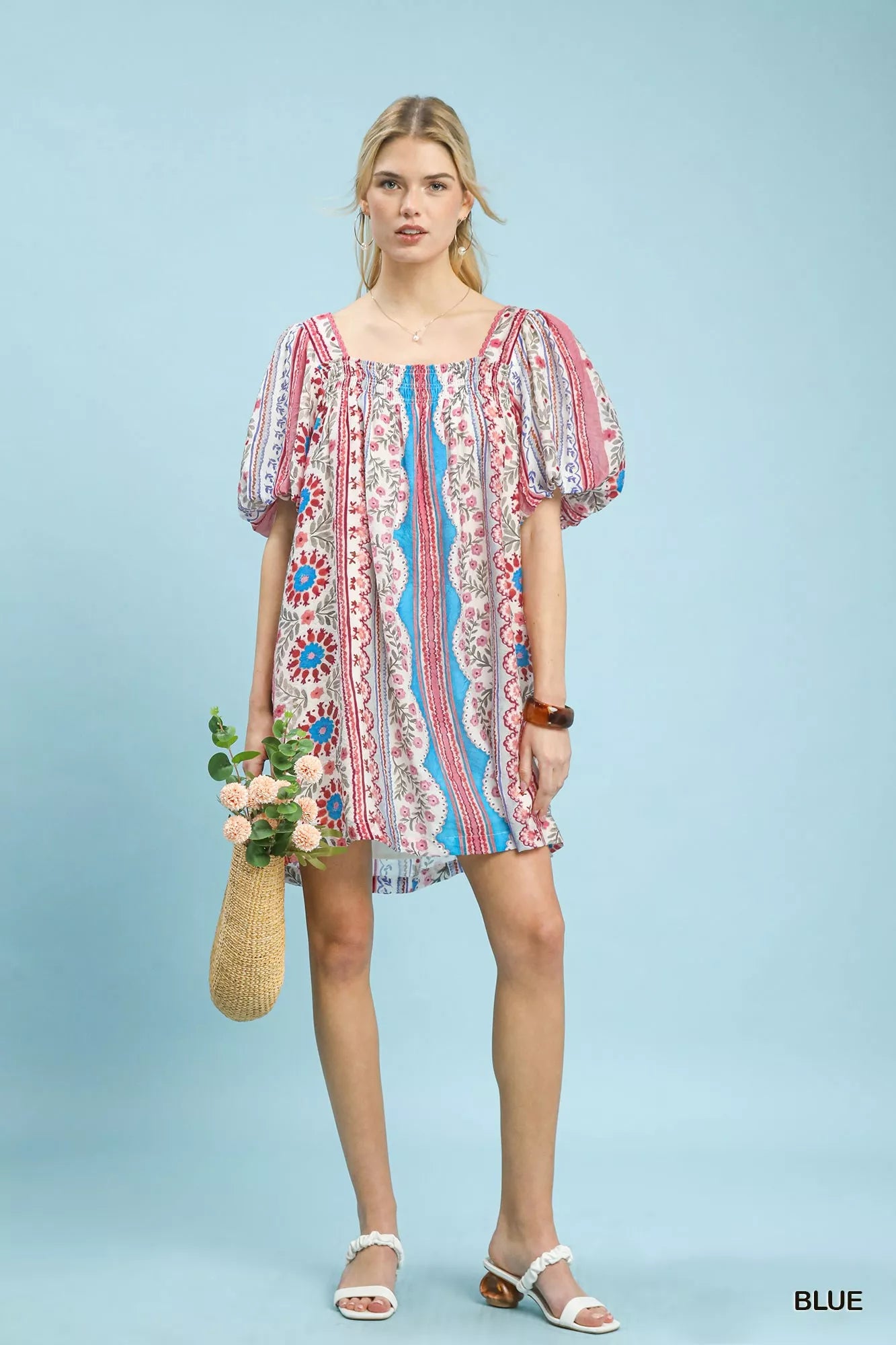 Blue Umgee mixed print puff sleeve mini dress with a fitted silhouette and stylish design, perfect for casual or semi-formal wear.
