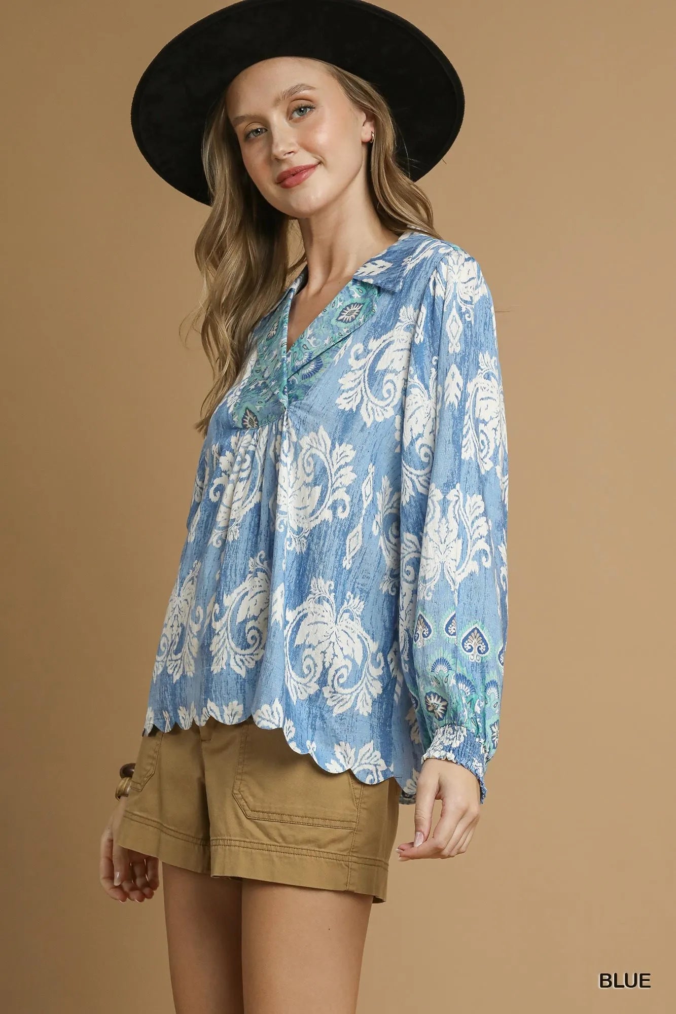 Blue printed long sleeve blouse by Umgee featuring a relaxed fit and stylish design, perfect for casual or office wear.