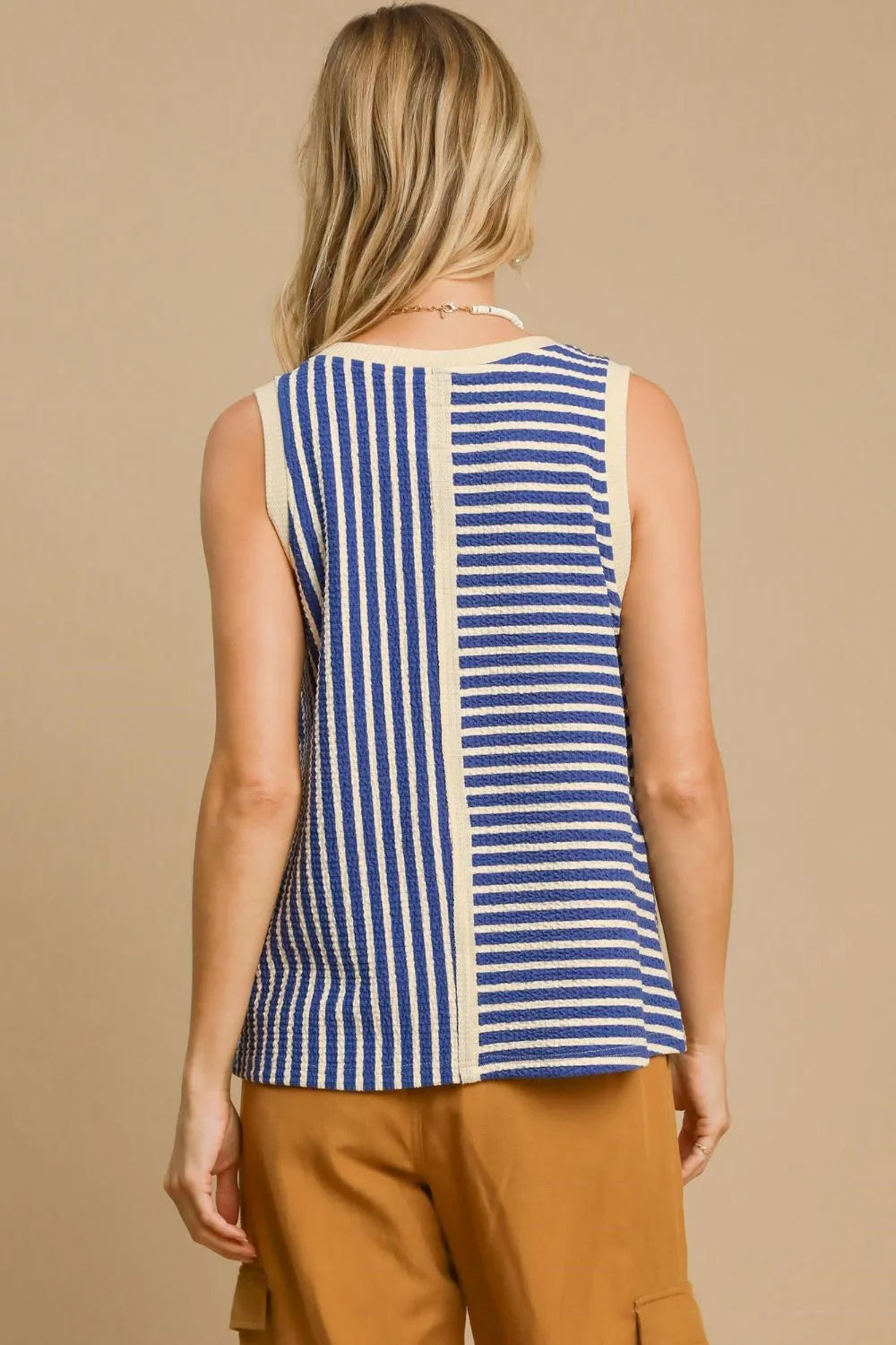 Blue Umgee striped tank top with a round neck and textured fabric, featuring a casual sleeveless design.