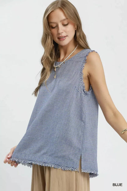 Blue Umgee sleeveless top with stripe pattern and fringe trim, featuring a stylish, casual design.