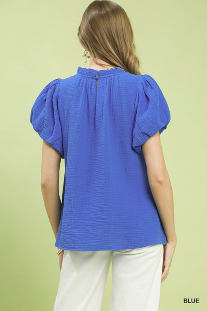 Blue Umgee textured gauze boho top with ruffle neckline, featuring a relaxed fit and casual, stylish design.
