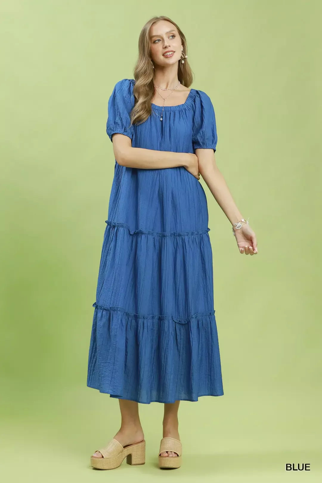 Blue Umgee Textured Tiered Midi Dress with ruffled layers, featuring a relaxed fit and sleeveless design.