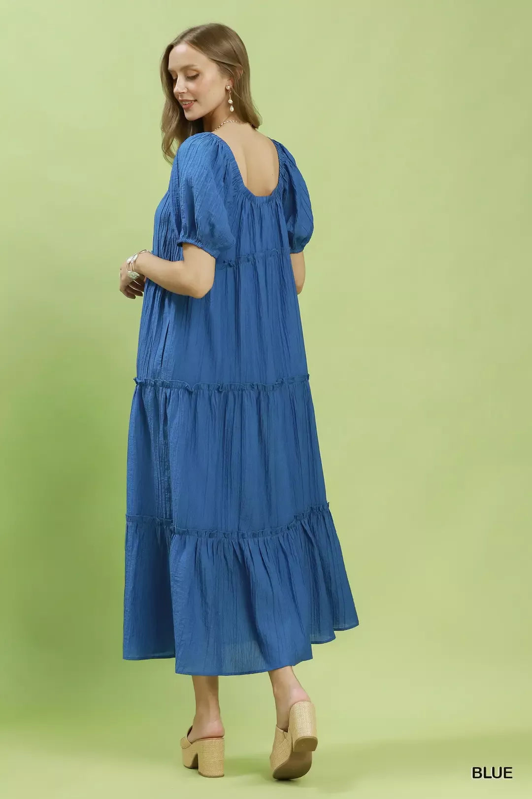 Blue Umgee textured tiered midi dress with a flowy silhouette and layered design, perfect for casual or semi-formal occasions.