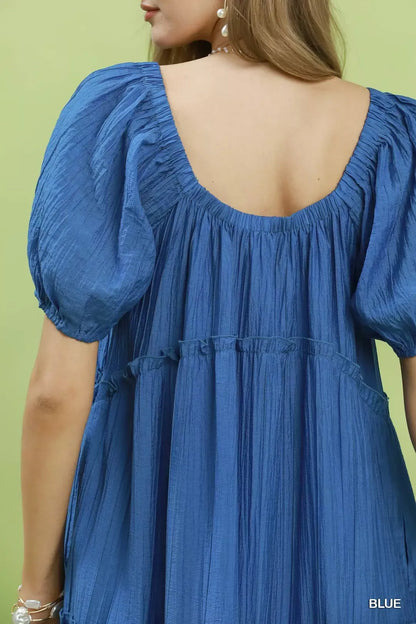 Blue Umgee textured tiered midi dress with a flowy silhouette and layered design, perfect for casual or semi-formal occasions.