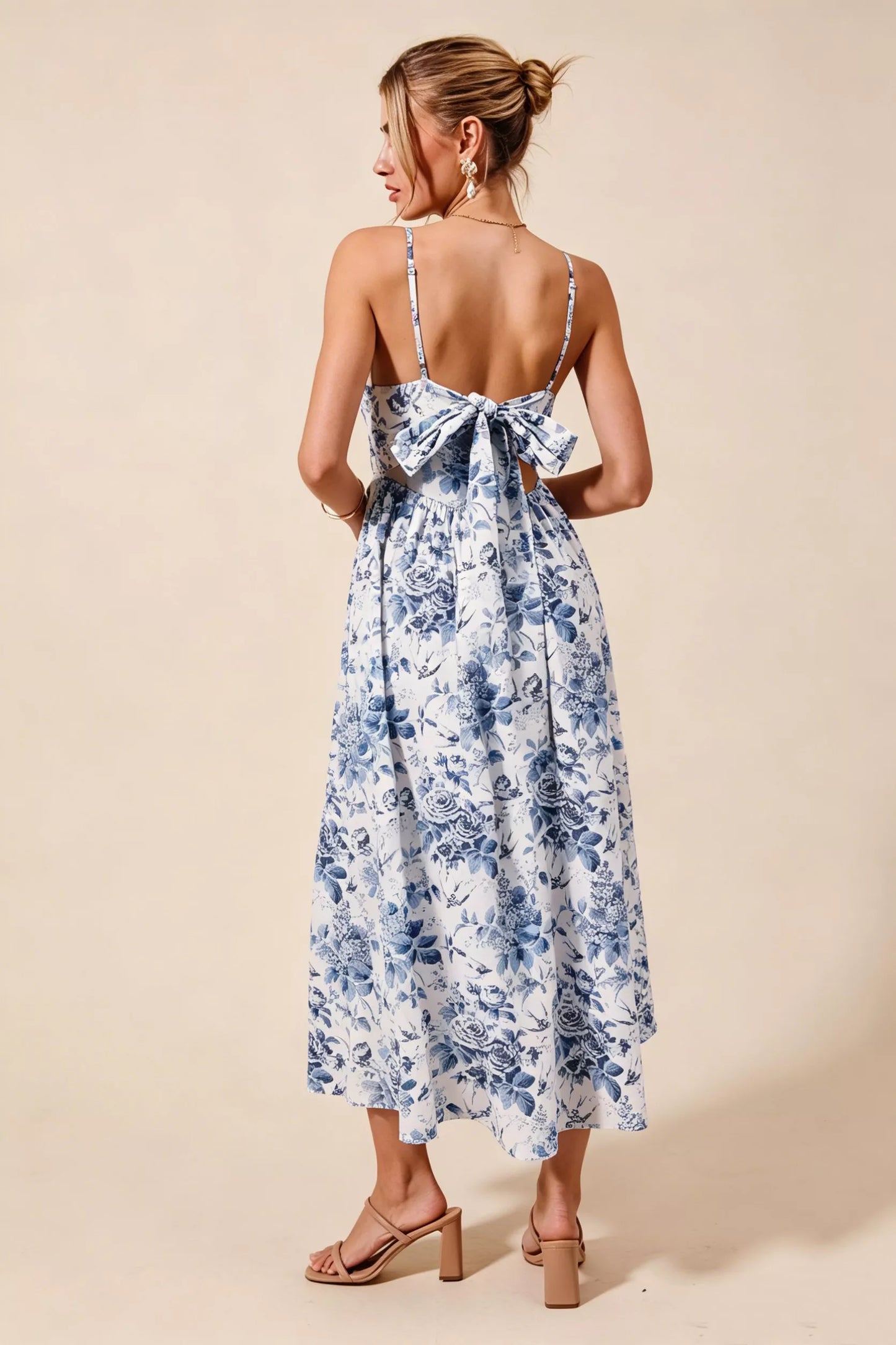 Blue floral woven V-neck dress with back ribbon tie from SO ME by Trendsi, featuring a stylish and feminine design.