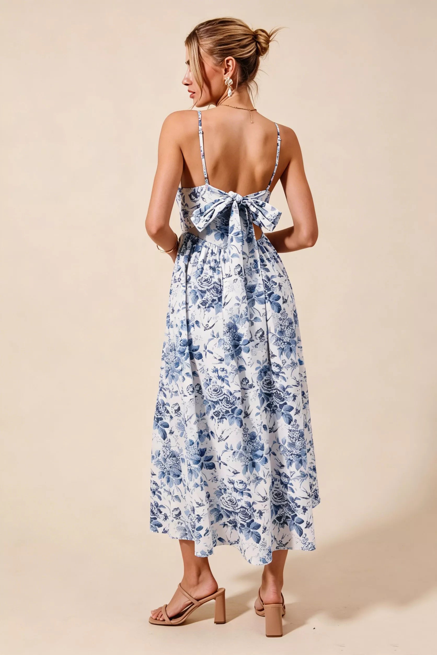 Blue floral woven V-neck dress with back ribbon tie from SO ME by Trendsi, featuring a stylish and feminine design.