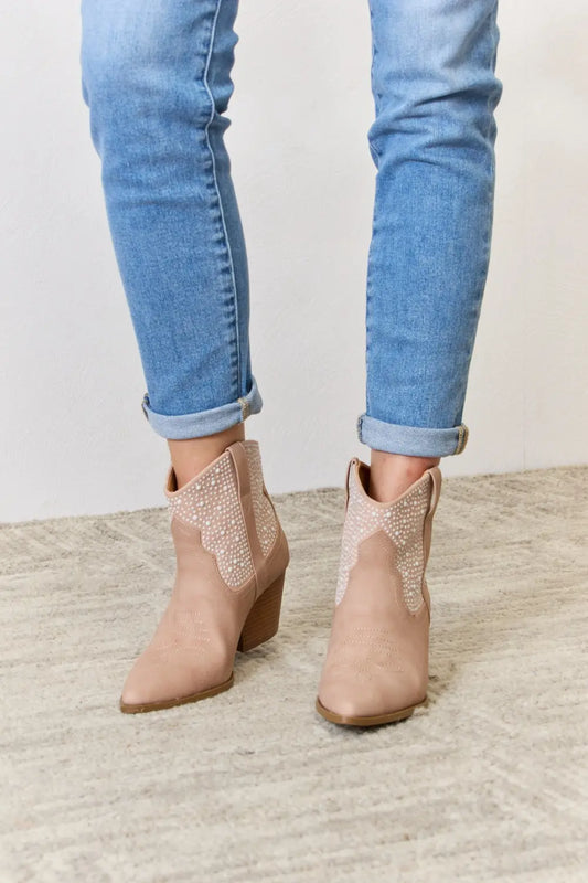 Blush rhinestone ankle cowgirl booties from East Lion Corp by Trendsi, featuring sparkling rhinestones and western-inspired design.