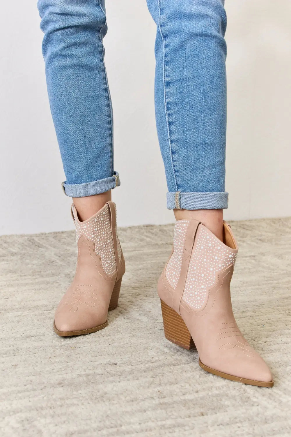 Blush rhinestone ankle cowgirl booties by East Lion Corp featuring a stylish Western design and sparkling embellishments.