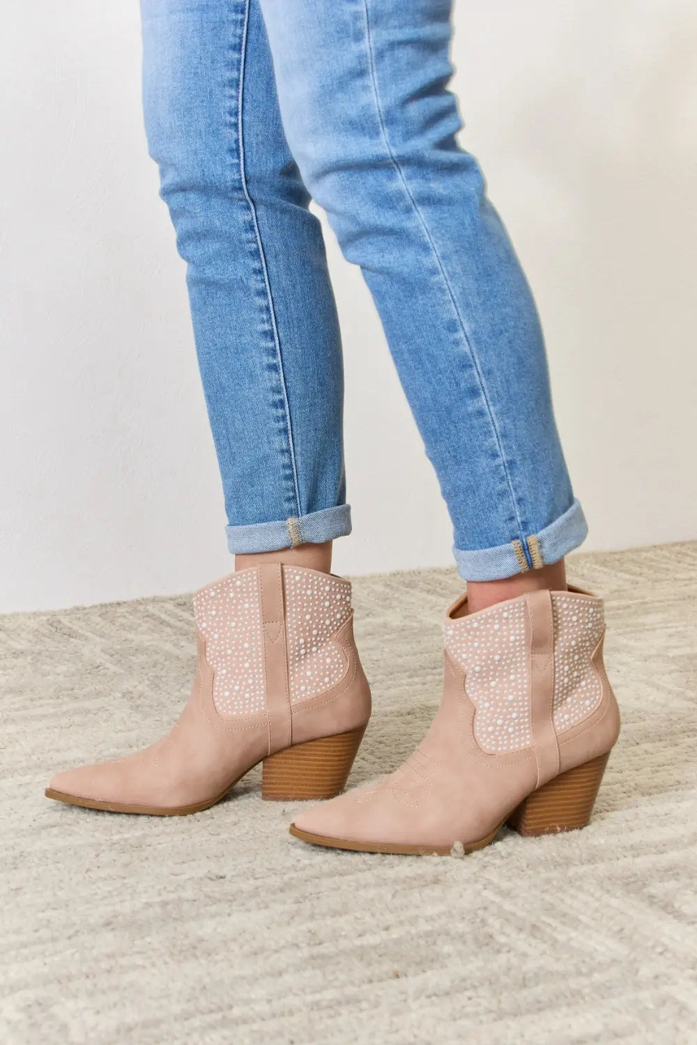Blush rhinestone ankle cowgirl booties by East Lion Corp with pointed toe and Western-inspired design, trendy and stylish.