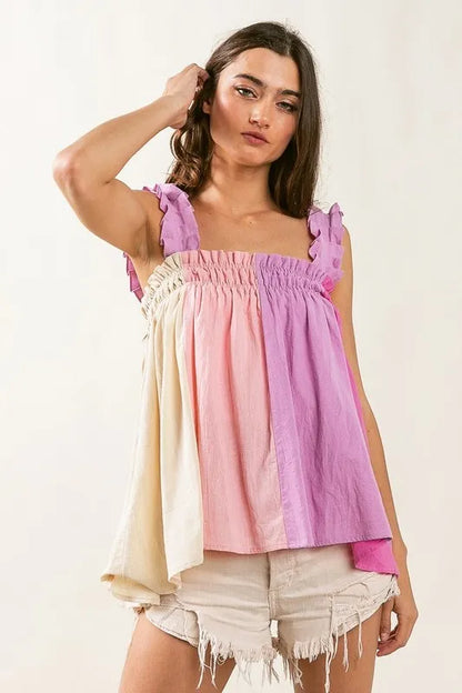 Blush and lavender color block BiBi frill shoulder strap bodice top by Trendsi, featuring a stylish off-shoulder design with ruffle details.