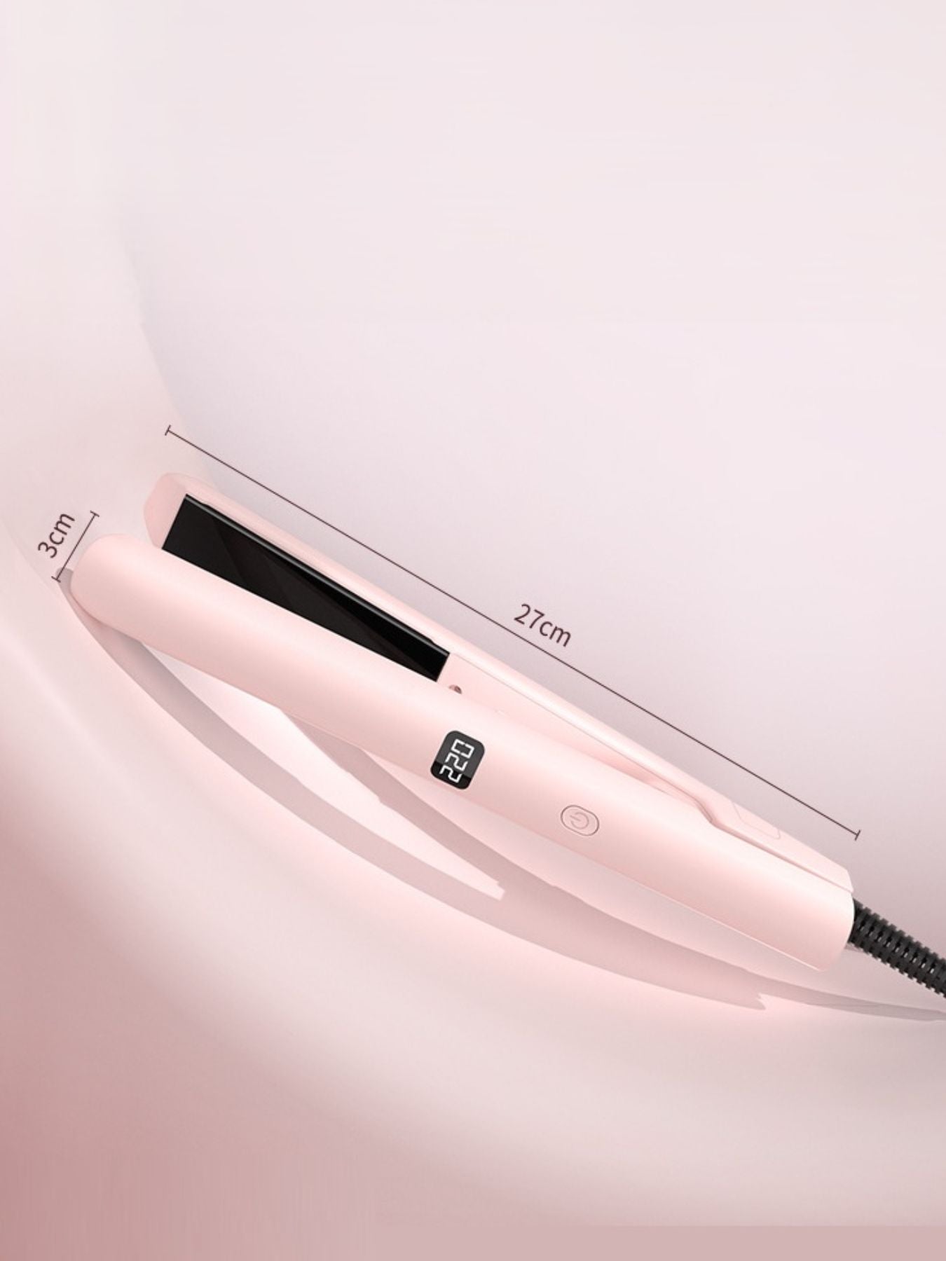 Blush pink adjustable temperature hair straightener from Trendsi with European plug for styling and smoothing hair.