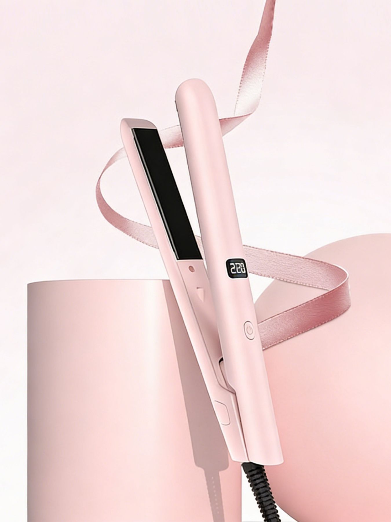 Blush pink Trendsi adjustable temperature hair straightener with European plug and sleek design for styling.
