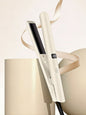 Blush pink adjustable temperature hair straightener with European plug from Trendsi, featuring ceramic plates for smooth styling.