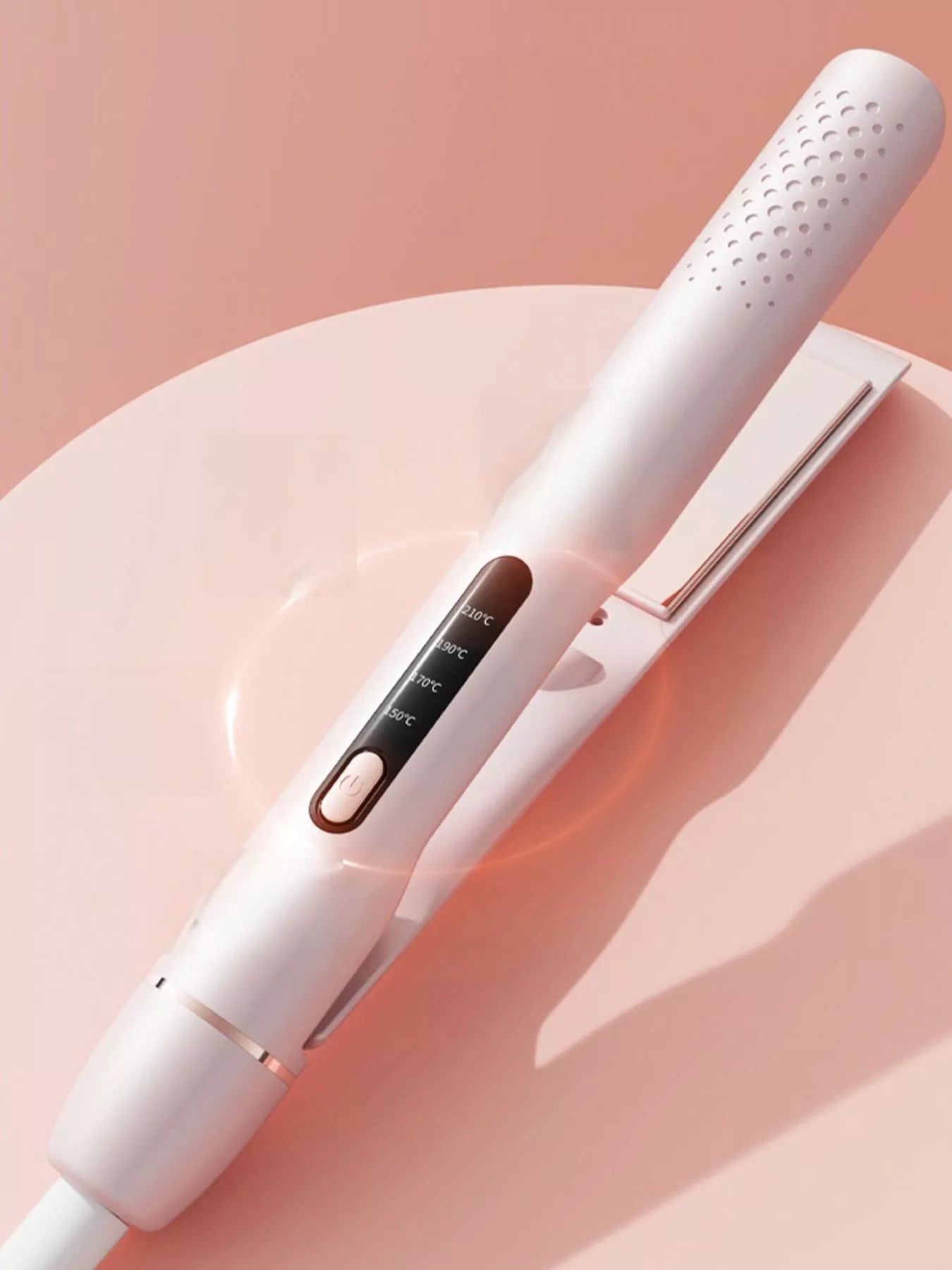 Blush pink Trendsi adjustable temperature hair straightener with European plug, sleek design for straightening hair.