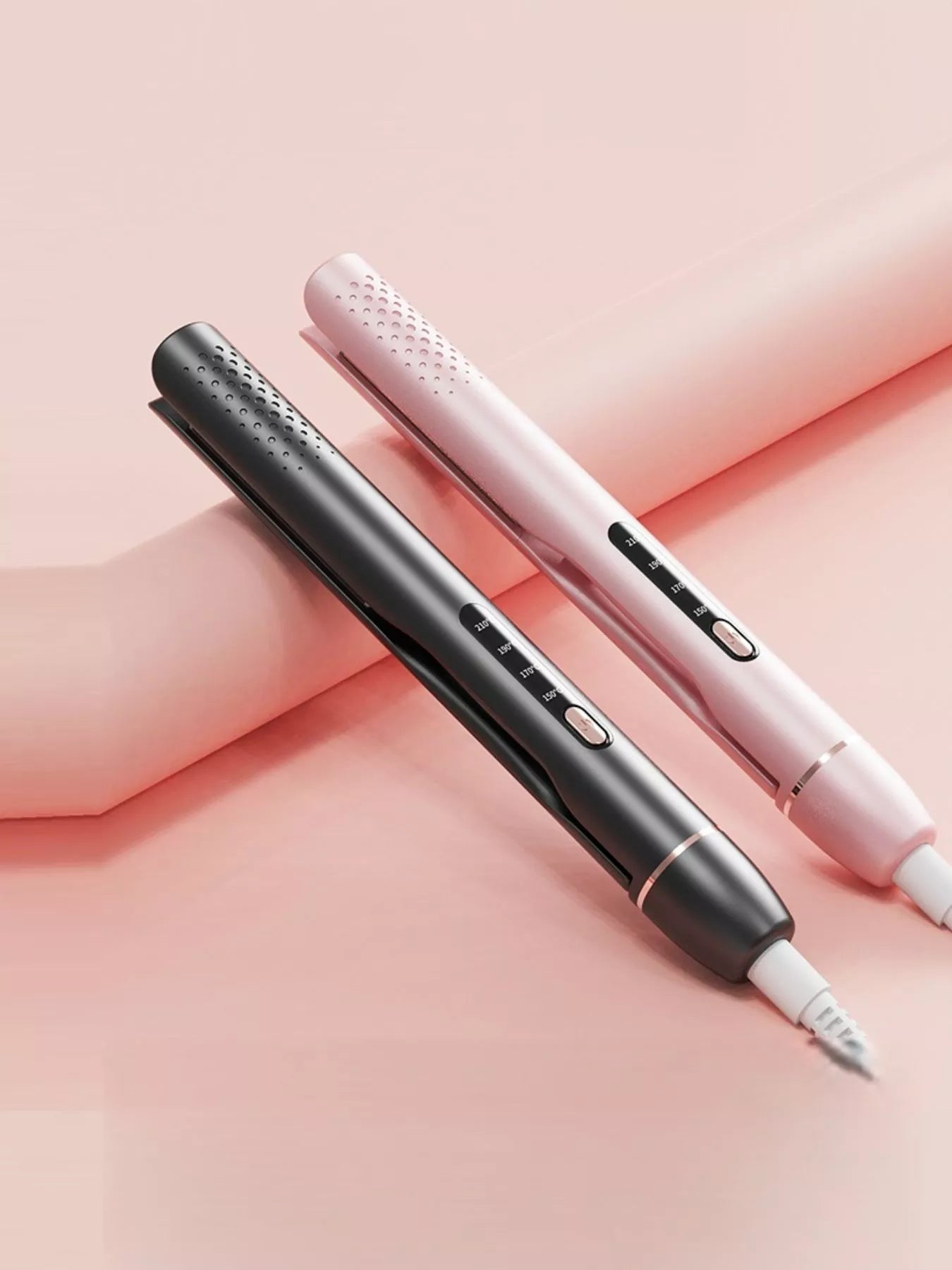 Blush pink Trendsi adjustable temperature hair straightener with European plug, sleek design for straightening hair.