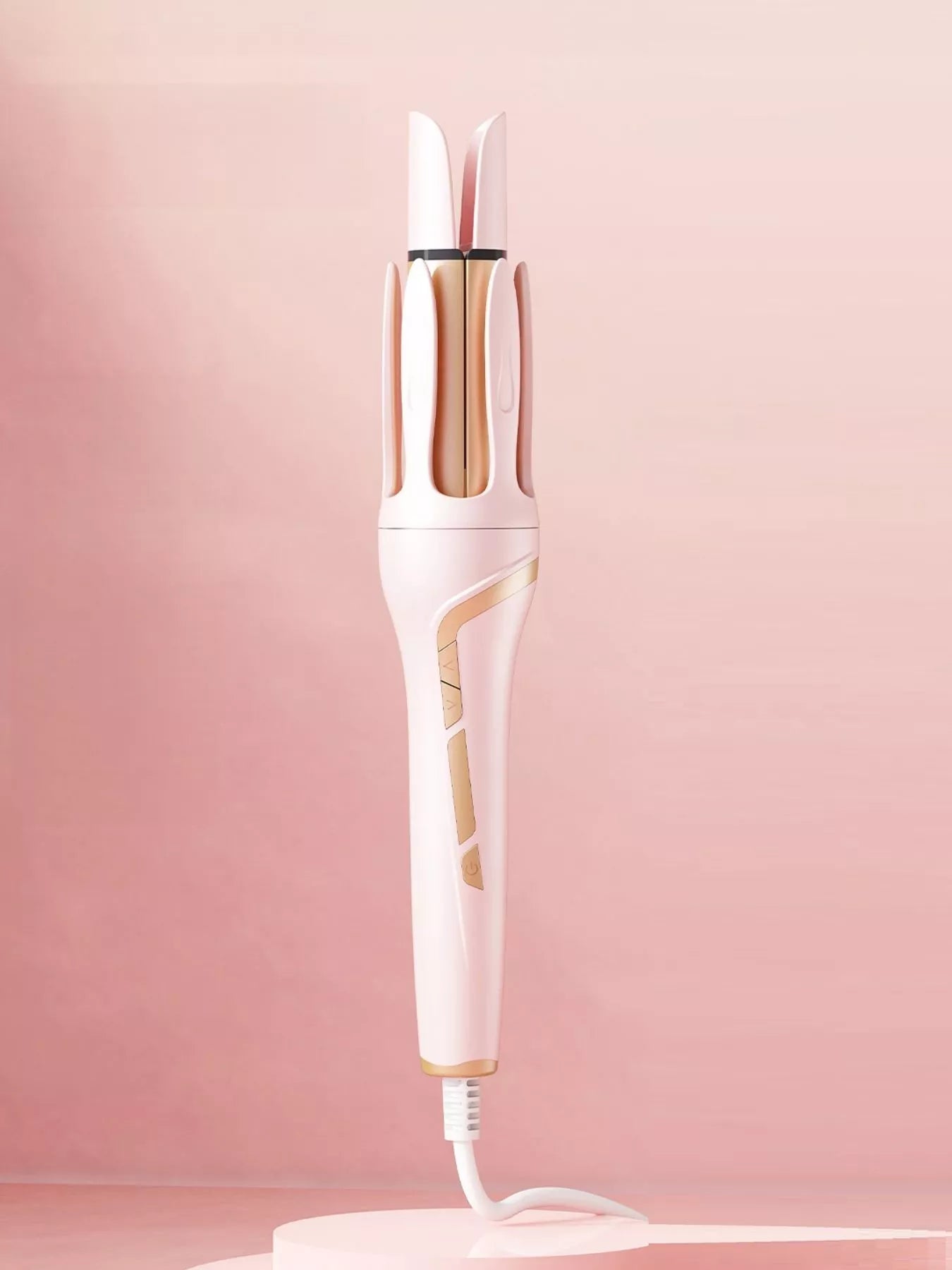 Blush pink automatic rotating ceramic curling iron with European plug, designed for easy, even curling by Trendsi.