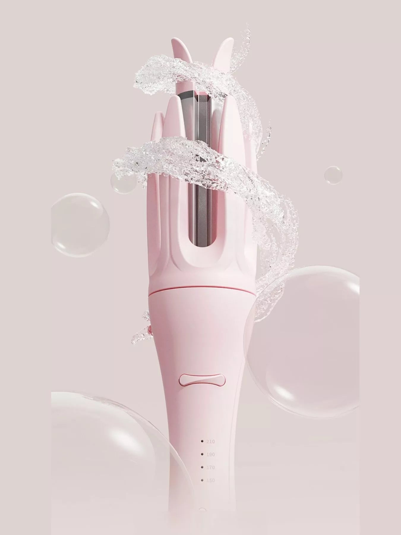 Blush pink automatic rotating ceramic curling iron with European plug, designed for creating smooth, styled curls effortlessly.