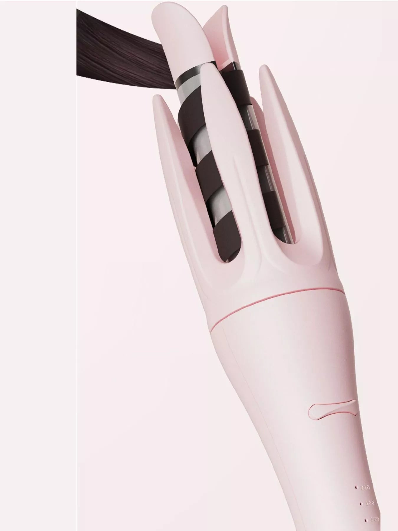 Blush pink automatic rotating ceramic curling iron by Trendsi with European plug for easy styling.
