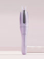 Blush pink automatic rotating ceramic curling iron by Trendsi with European plug for creating smooth, bouncy curls.