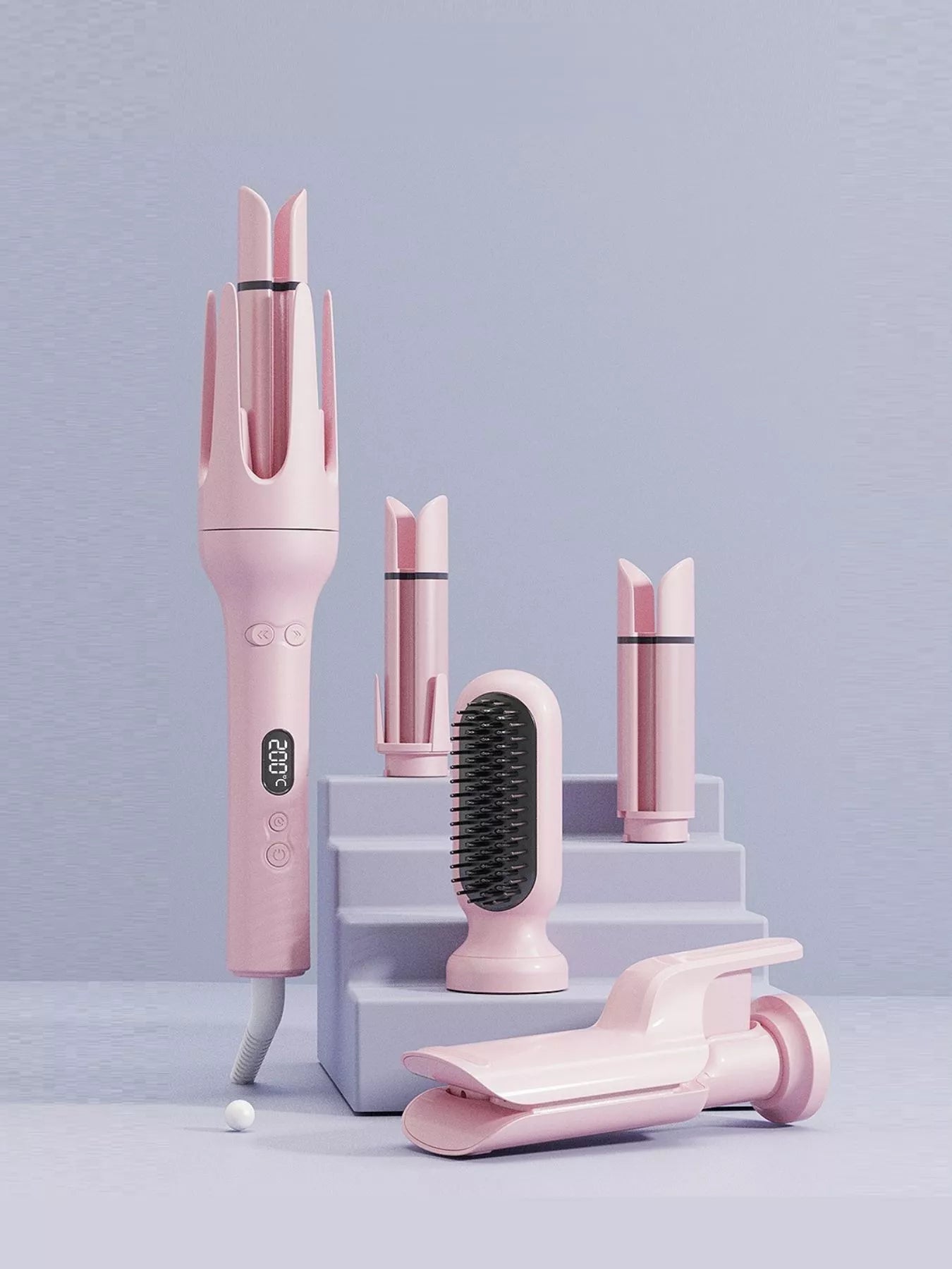 Blush pink automatic rotating ceramic hair curling iron with European plug by Trendsi, showcasing its sleek design and rotating barrel.