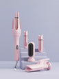 Blush pink automatic rotating ceramic hair curling iron with European plug by Trendsi, showcasing its sleek design and rotating barrel.