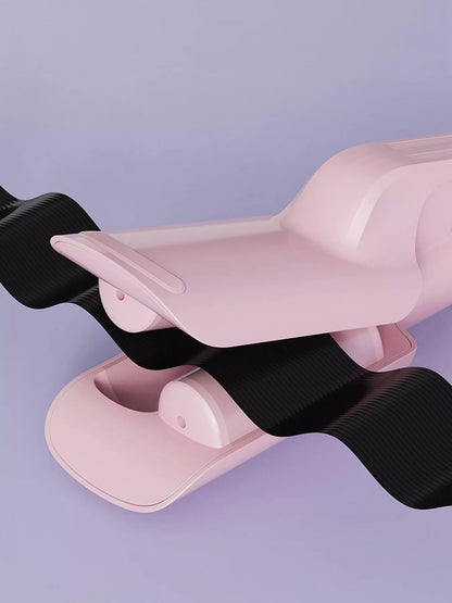 Blush pink automatic rotating ceramic hair curling iron with European plug by Trendsi, designed for effortless curls.