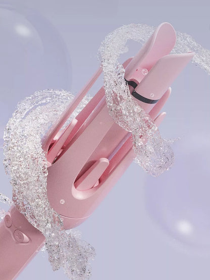 Blush pink automatic rotating ceramic hair curling iron with European plug by Trendsi for creating bouncy curls.