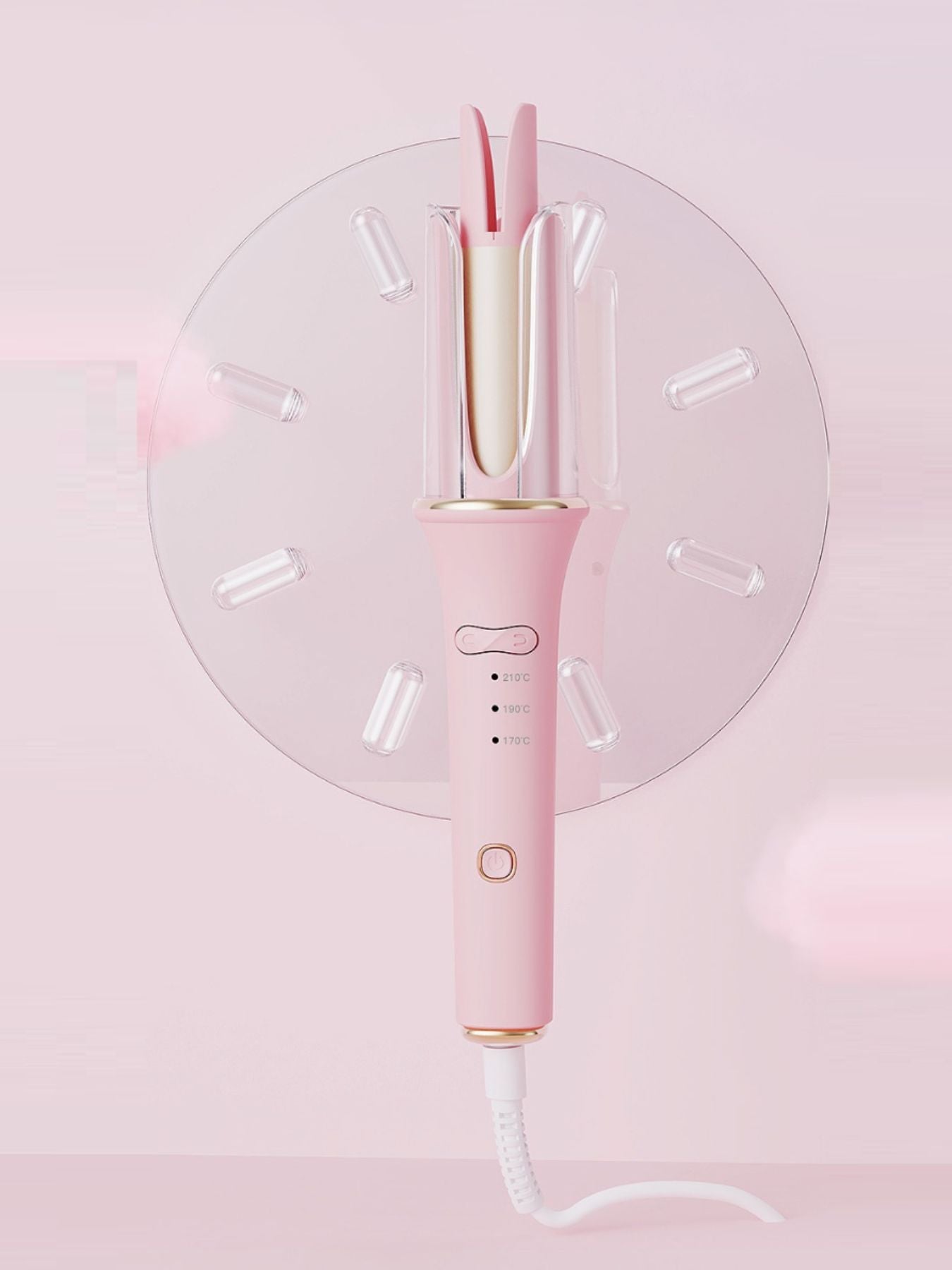Blush pink automatic ceramic hair curling iron with European plug, featuring rotating barrel for easy styling by Trendsi.
