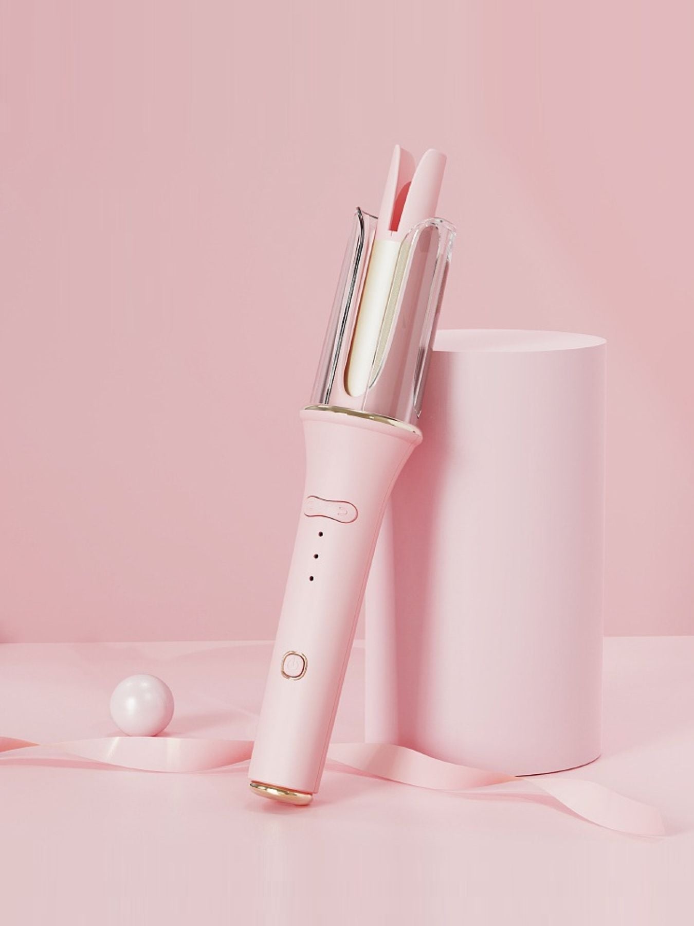 Blush pink automatic rotating ceramic hair curling iron with European plug for easy styling by Trendsi